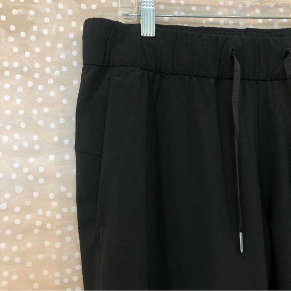 Lululemon On The Fly Pant 28” Black Size 10 Drawstring Pockets Style W5AHOS - Picture 4 of 10